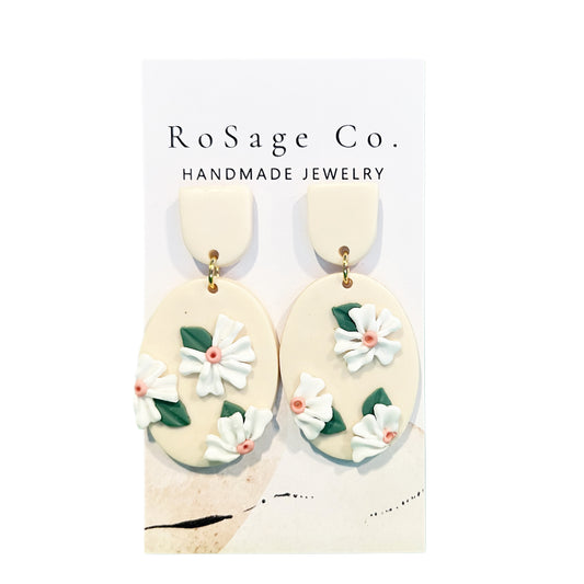 Cream Colored Clay Earrings with White Flowers